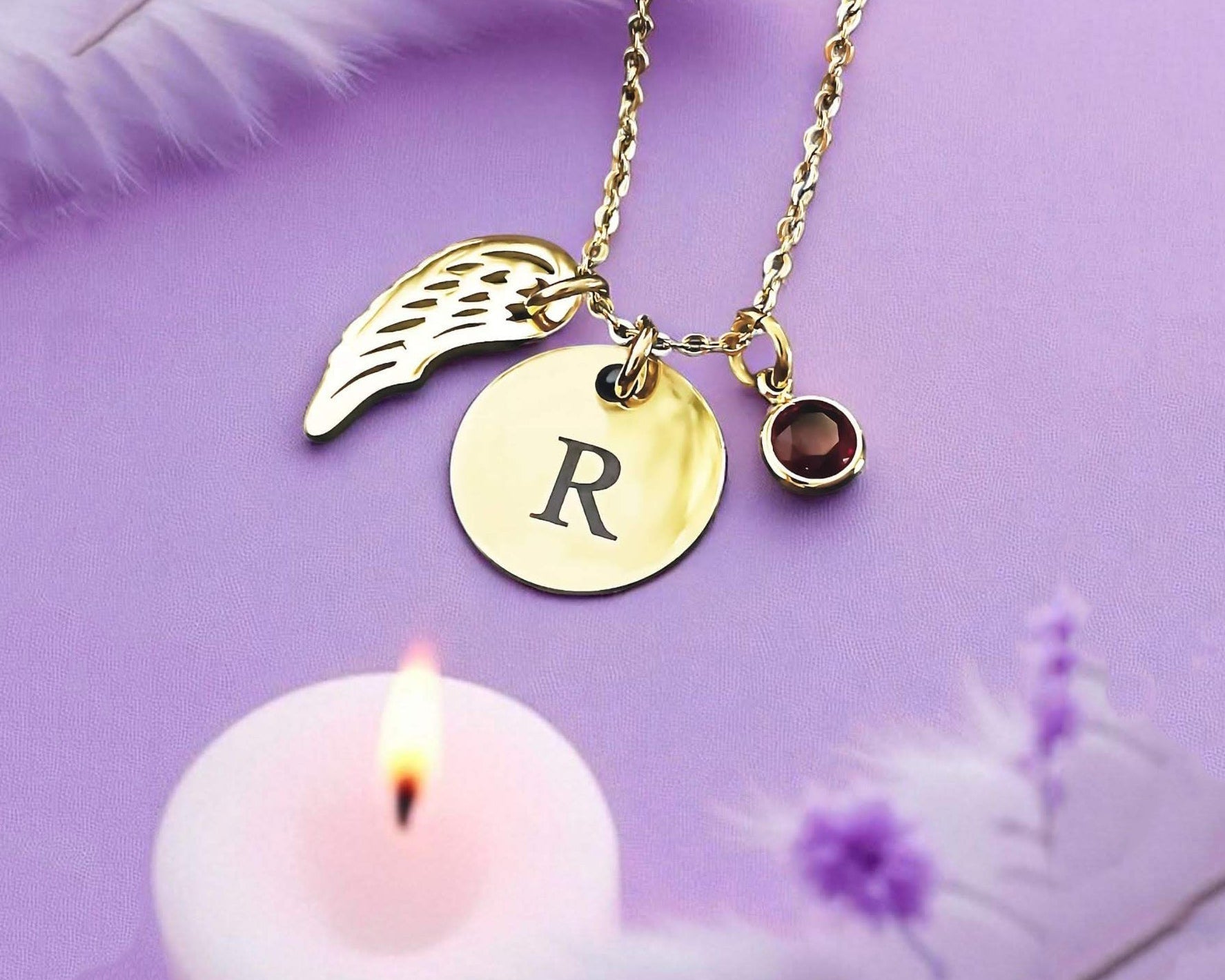 Memorial necklace with angel wing charm and personalised initial disc by Belle Fever, handcrafted in non-tarnish Monel materials for remembrance and comfort