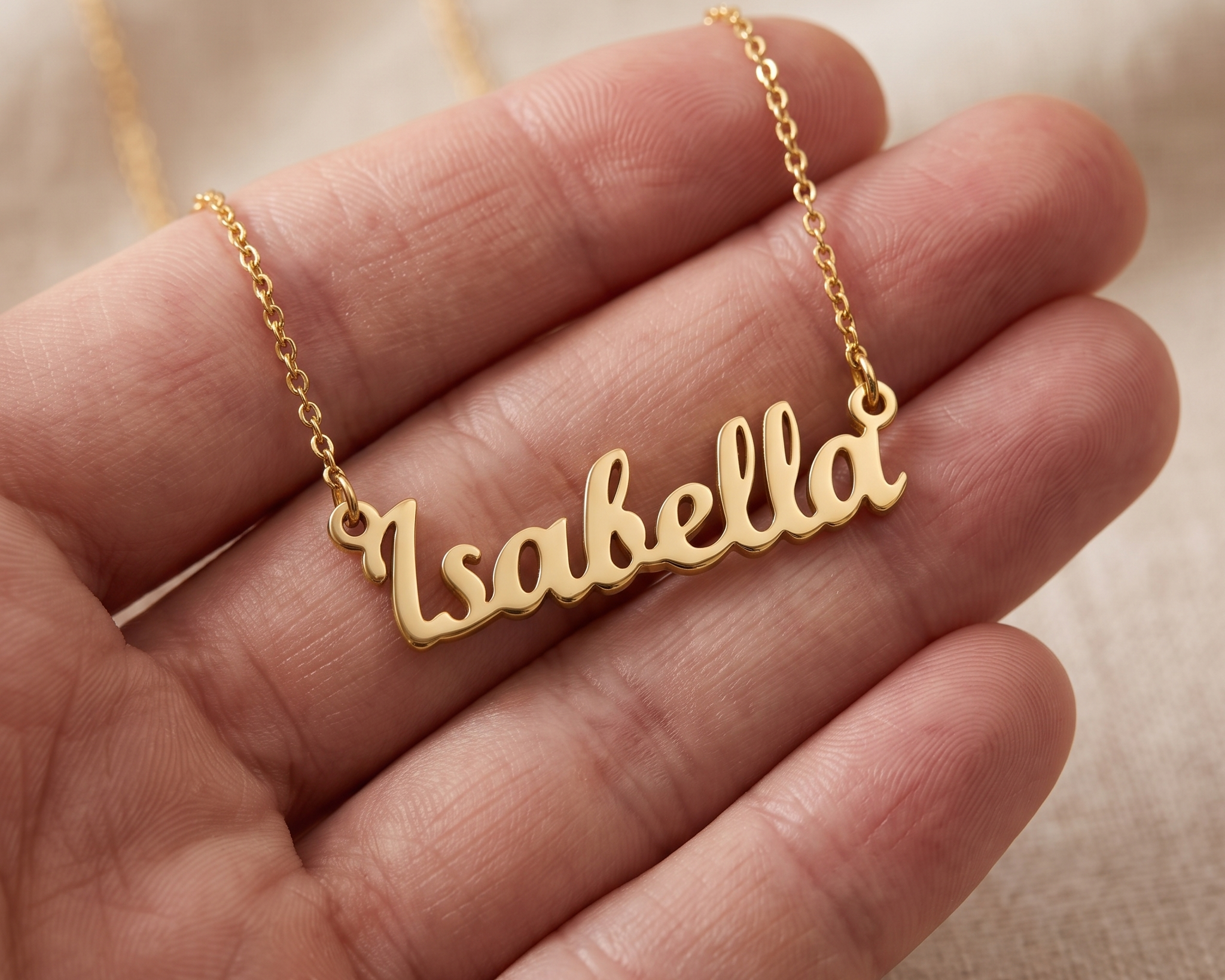 A bright engraved pendant showing crisp lettering in daylight