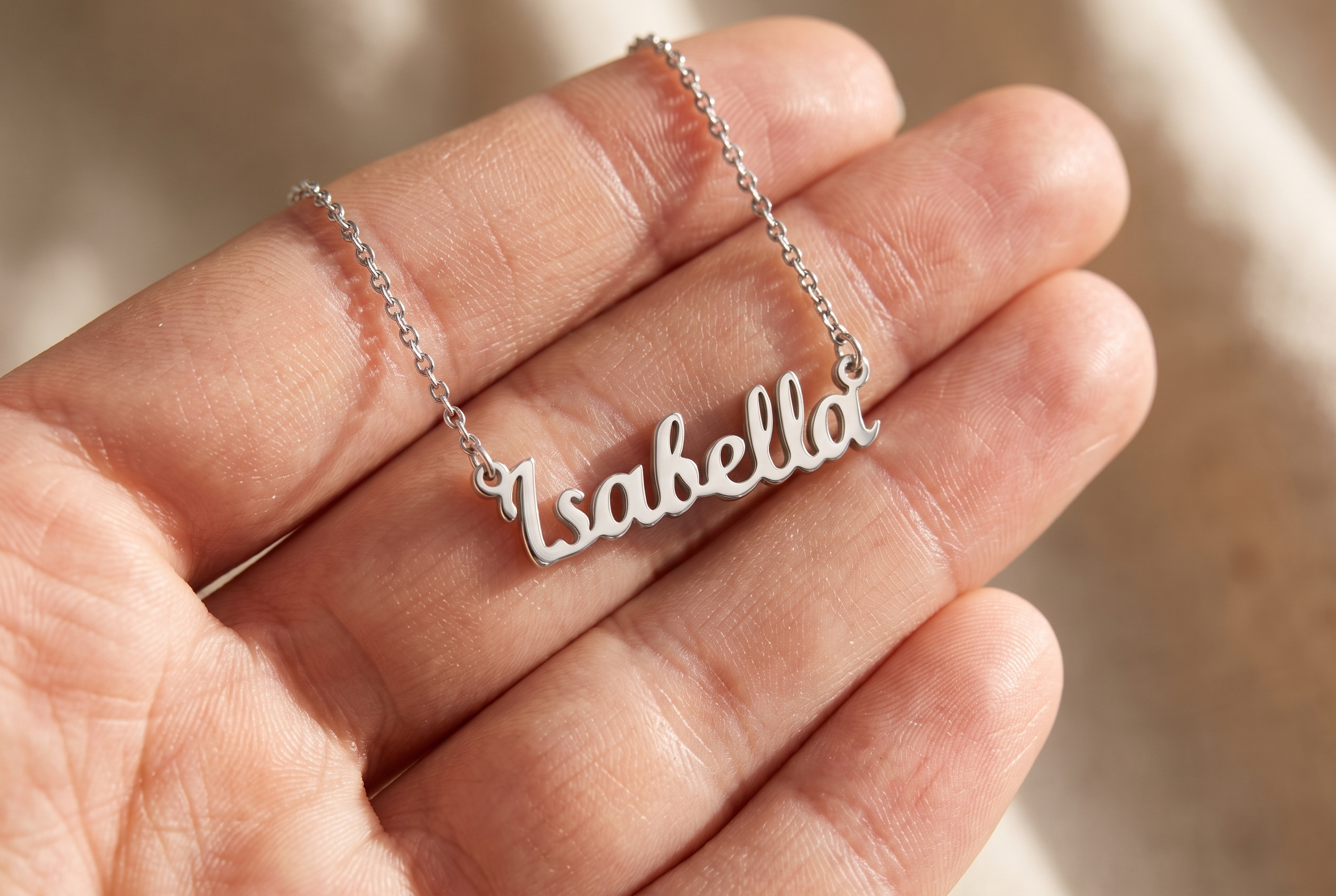 Monel Silver personalised name necklace worn on the collarbone