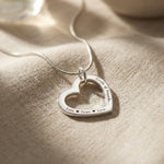 Belle Fever Silver Always In My Heart necklace on soft fabric, personalised heart necklace, romantic engraved jewellery