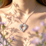 Belle Fever gold angel heart necklace worn by model elegant and symbolic jewellery, perfect for everyday wear or as a heartfelt gift