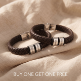 Personalised leather bracelets with two engraved name charms, featured in a Buy One Get One Free offer for meaningful matching gifts.