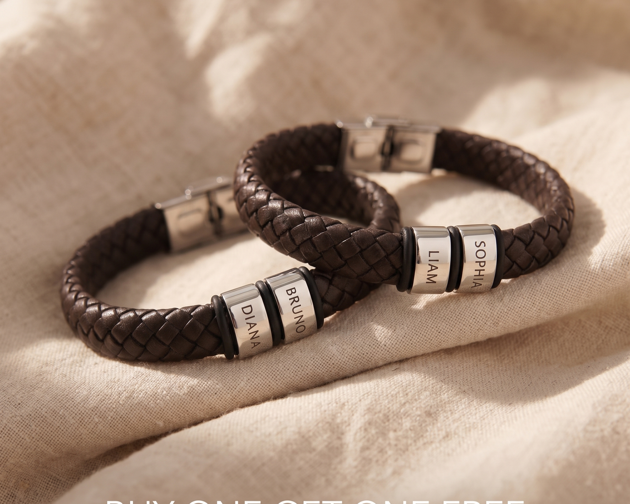 Personalised leather bracelets with two engraved name charms, featured in a Buy One Get One Free offer for meaningful matching gifts.