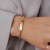 Gold Belle Fever Bar Bracelet — elegant engraved bracelet handcrafted to celebrate love, strength, and individuality with timeless sophistication.