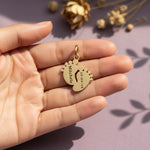 belle fever personalized feet charm for keyring held in hand, engraved name and date sentimental gift