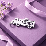 Belle Fever silver fire truck charm on lavender box with ribbon and flowers, personalised firefighter charm jewellery gift