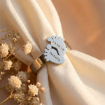 Close-up Footprint ring with engraved name and date, timeless keepsake jewelry gift for mom by Belle Fever