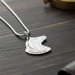 Belle Fever Horse Head Necklace with Custom Name in bright silver finish on dark wood surface, custom engraved horse pendant necklace, personalised equestrian jewellery gift.