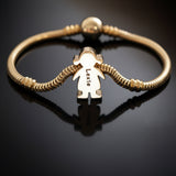 Belle Fever rose gold moments bracelet with girl charm on dark background — a meaningful gift for mums, grandmas, and families cherishing their little ones