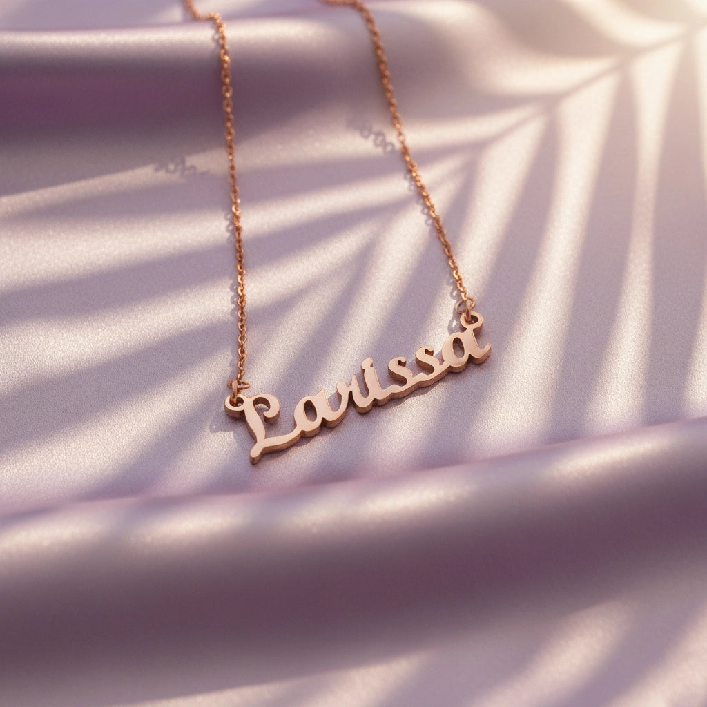 Personalised Belle Fever Name Necklace in rose gold — elegant script design handcrafted to showcase your name as a symbol of love and identity.