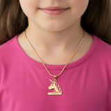 Custom unicorn head necklace with birthstone pendant worn around the neck.
