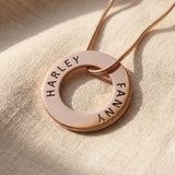 Always Forever necklace in gold with engraved names on circle pendant, refined personalised jewellery