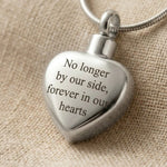 Close up of Always Love cremation necklace heart urn pendant with engraved memorial message