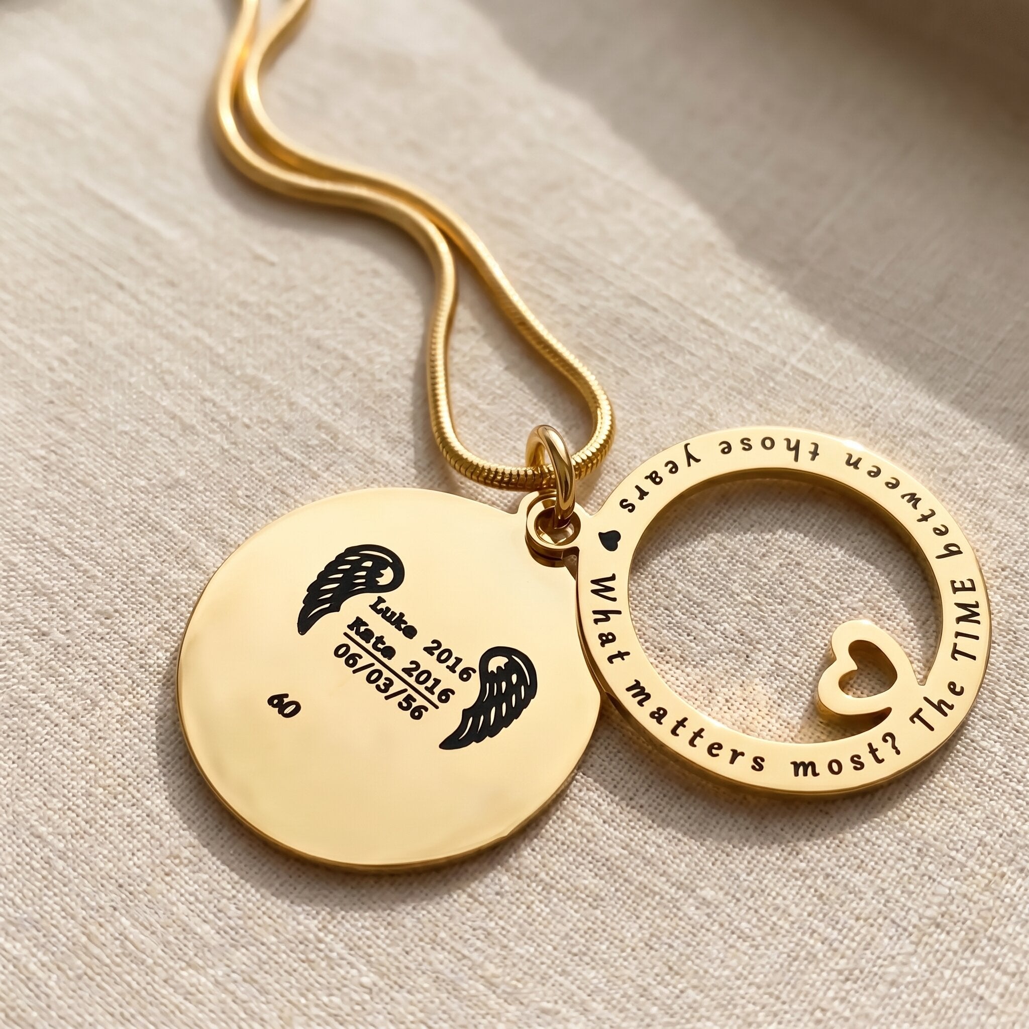Always on my mind necklace showing layered round disc and washer pendant with personalised engraved detail