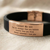 Close up of Always Remember personalised ID bracelet showing engraved message on metal plate