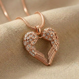 Angels Heart necklace in rose gold with heart angel wings pendant on delicate chain