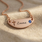 Beck name necklace showing cross design option with engraved name and birthstone detail