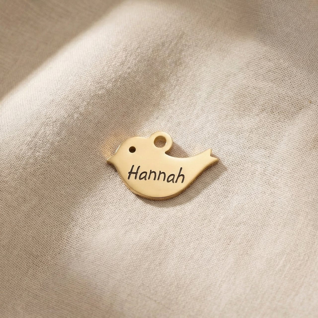 Personalized gold bird charm for Dream Locket bracelet symbolizing freedom, hope, and meaningful memories