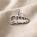 Silver bus charm for keyring symbolizing travel memories, daily journeys, and transportation-inspired keepsakes
