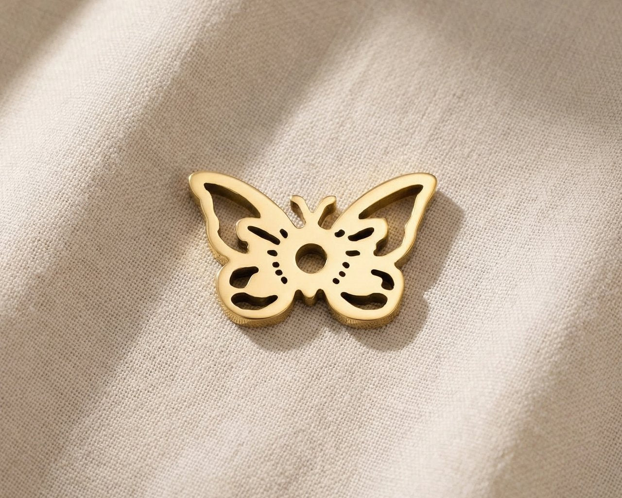 Gold butterfly charm for Dream Locket bracelet symbolizing transformation, beauty, and new beginnings