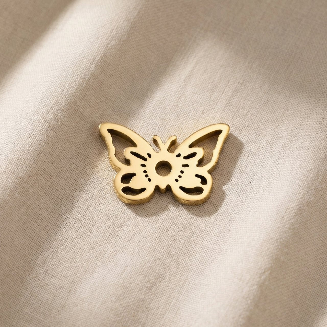 Gold butterfly charm for Dream Locket bracelet symbolizing transformation, beauty, and new beginnings