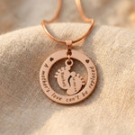 Rose Gold Can’t Be Replaced Necklace with engraved message and baby feet charm pendant