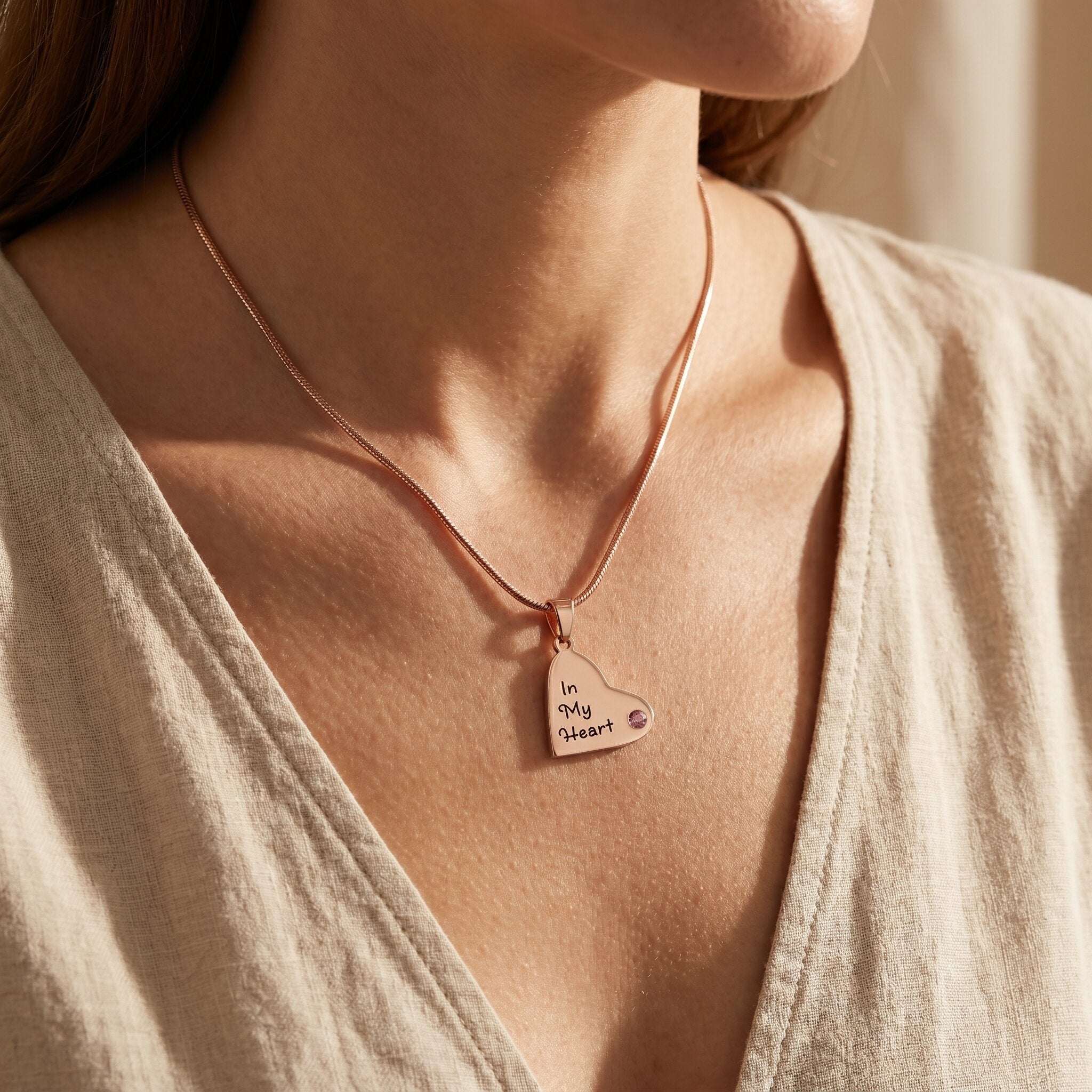 Woman wearing children heart birthstone necklace, meaningful family jewellery celebrating love and children connection