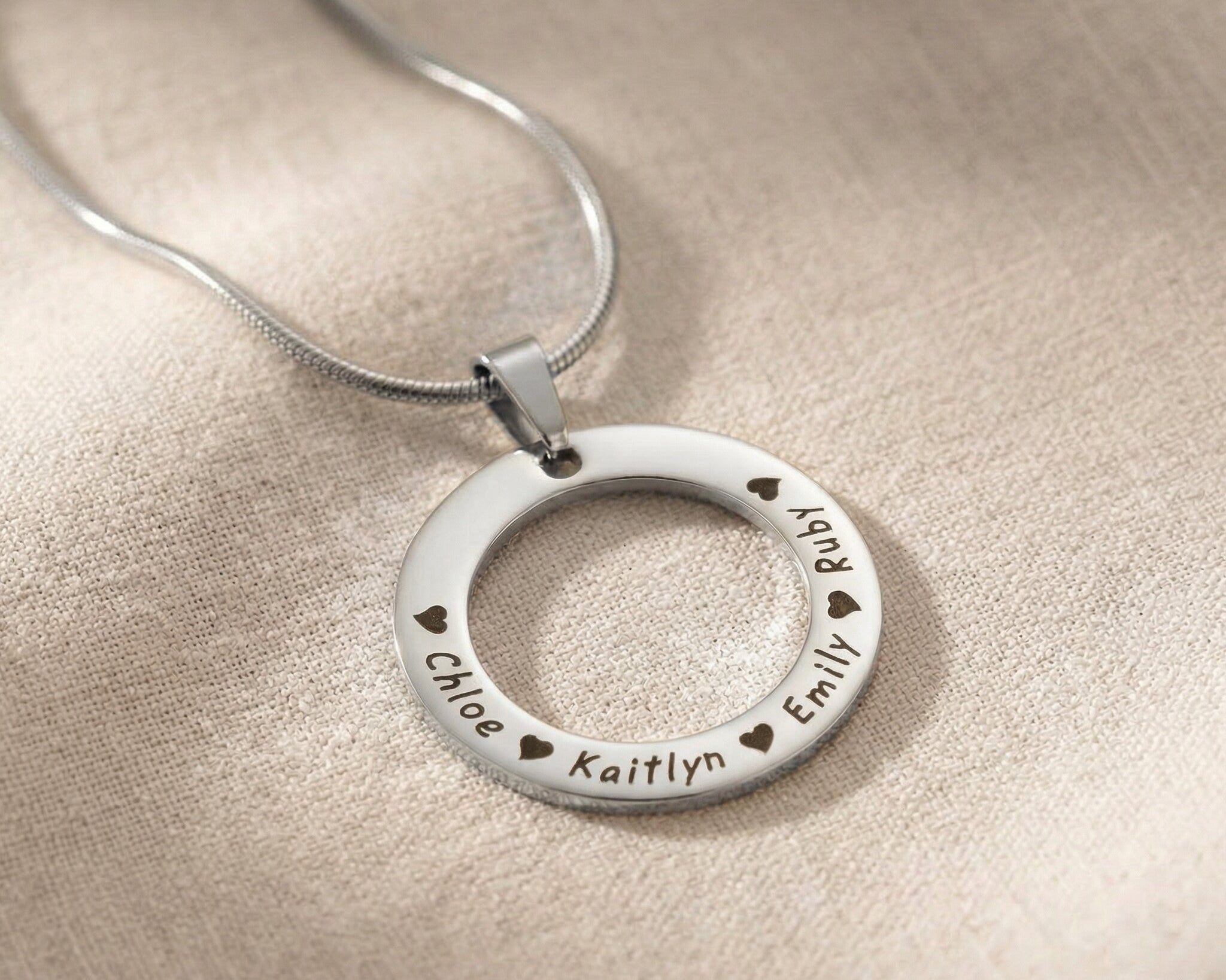 Circle of Trust Necklace silver personalized circle pendant with engraved names minimalist jewelry close-up
