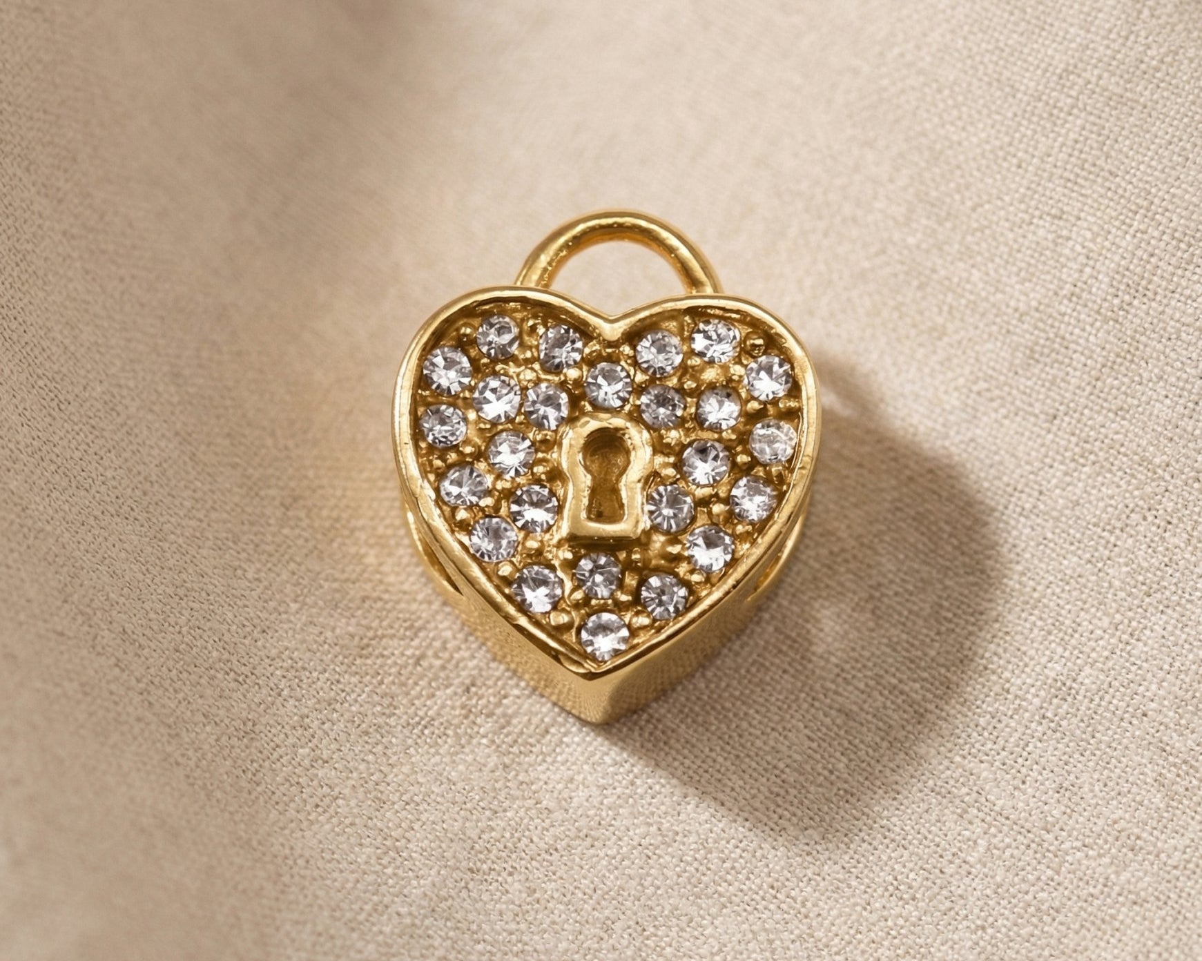 Gold heart lock charm with crystal accents for Moments Bracelet in romantic luxury jewelry style