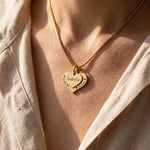 Woman wearing double heart necklace, personalised love jewellery symbolising family connection and meaningful bond