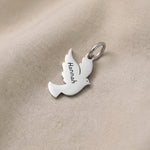 Silver dove charm for keyring symbolizing peace, hope, remembrance, and meaningful spiritual connection
