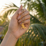 Dragonfly Necklace with Custom Engraved Names by Belle Fever displayed in hand, symbolic resilience and transformation jewellery gift.