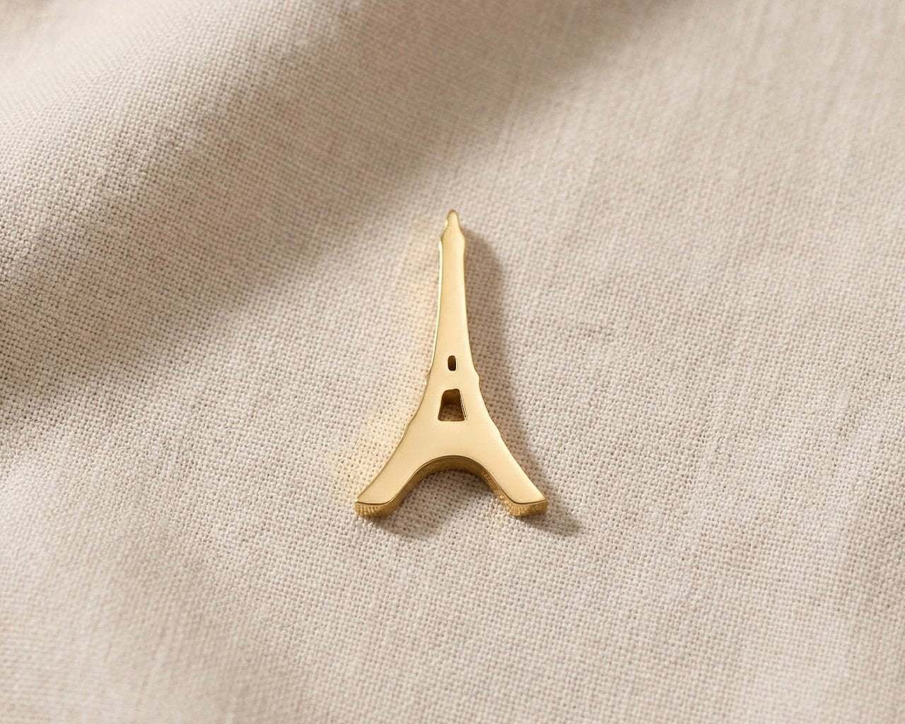 Gold Eiffel Tower charm for Dream Locket bracelet symbolizing travel memories, romance, and Paris-inspired moments