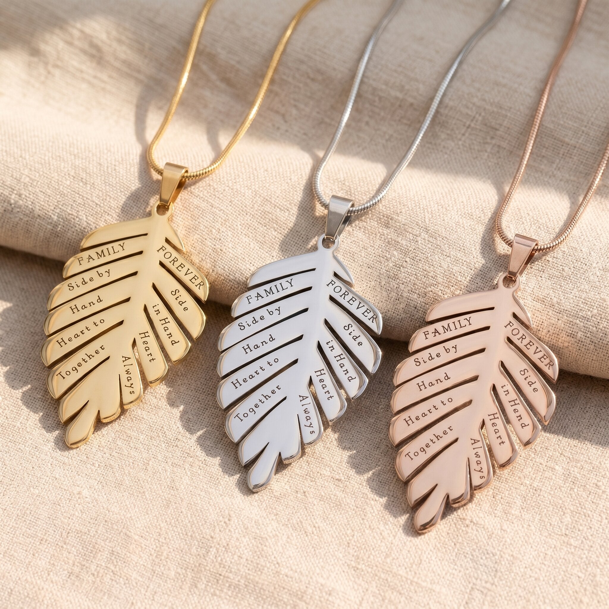 Family leaf necklace tone comparison showing gold, silver and rose gold finishes, personalised keepsake jewellery