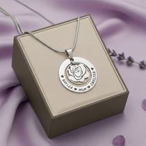 Personalized rose family necklace in silver with engraved family names displayed on gift box, belle fever meaningful gift for mom.