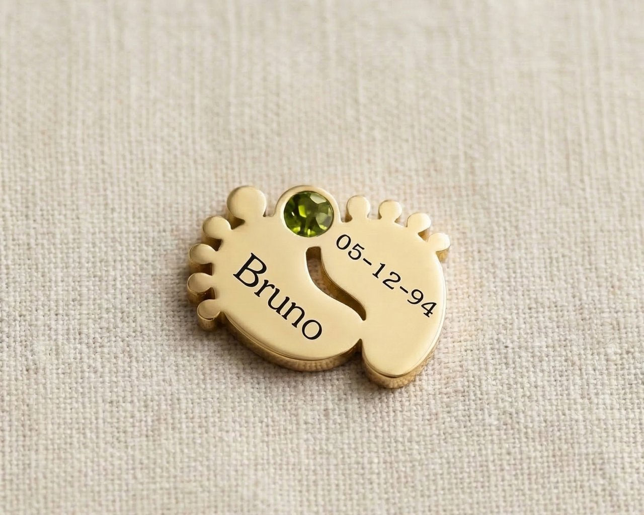 Gold baby feet birthstone charm for Dream Locket bracelet celebrating newborn milestones and family memories