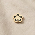 Gold flower charm for Dream Locket bracelet symbolizing beauty, growth, and meaningful life moments
