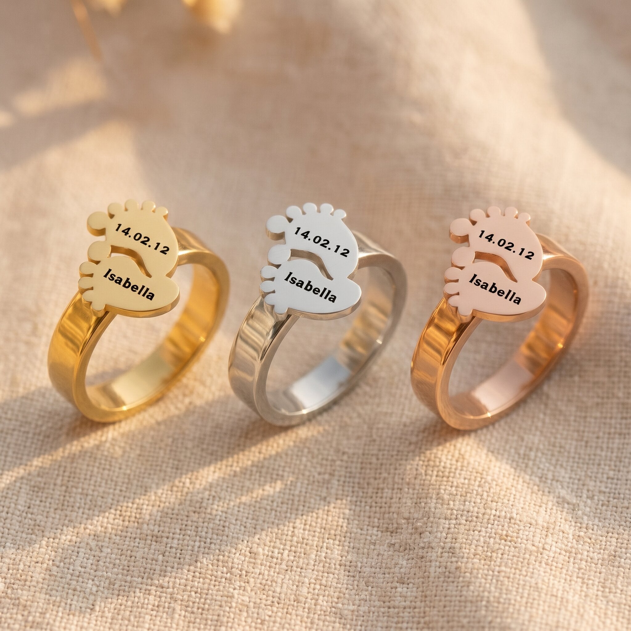 Footprint ring tone comparison showing gold, silver and rose gold finishes, personalised mother keepsake gift