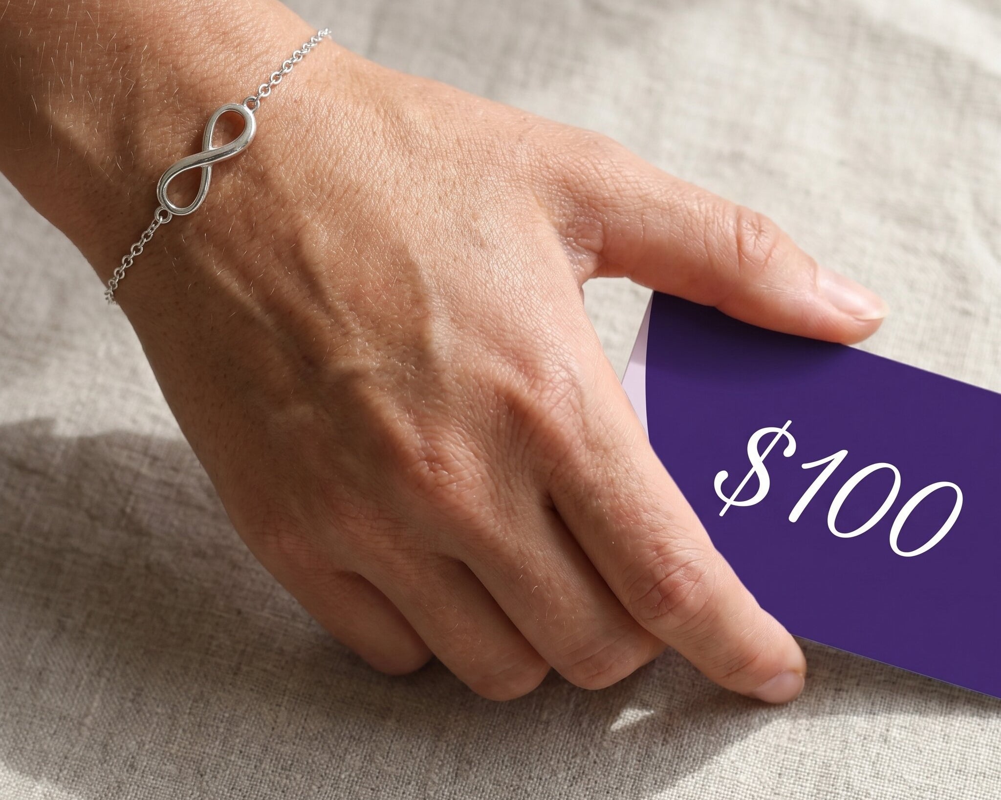 Gift card offer with free silver infinity bracelet, jewellery gift voucher and bonus bracelet promotion
