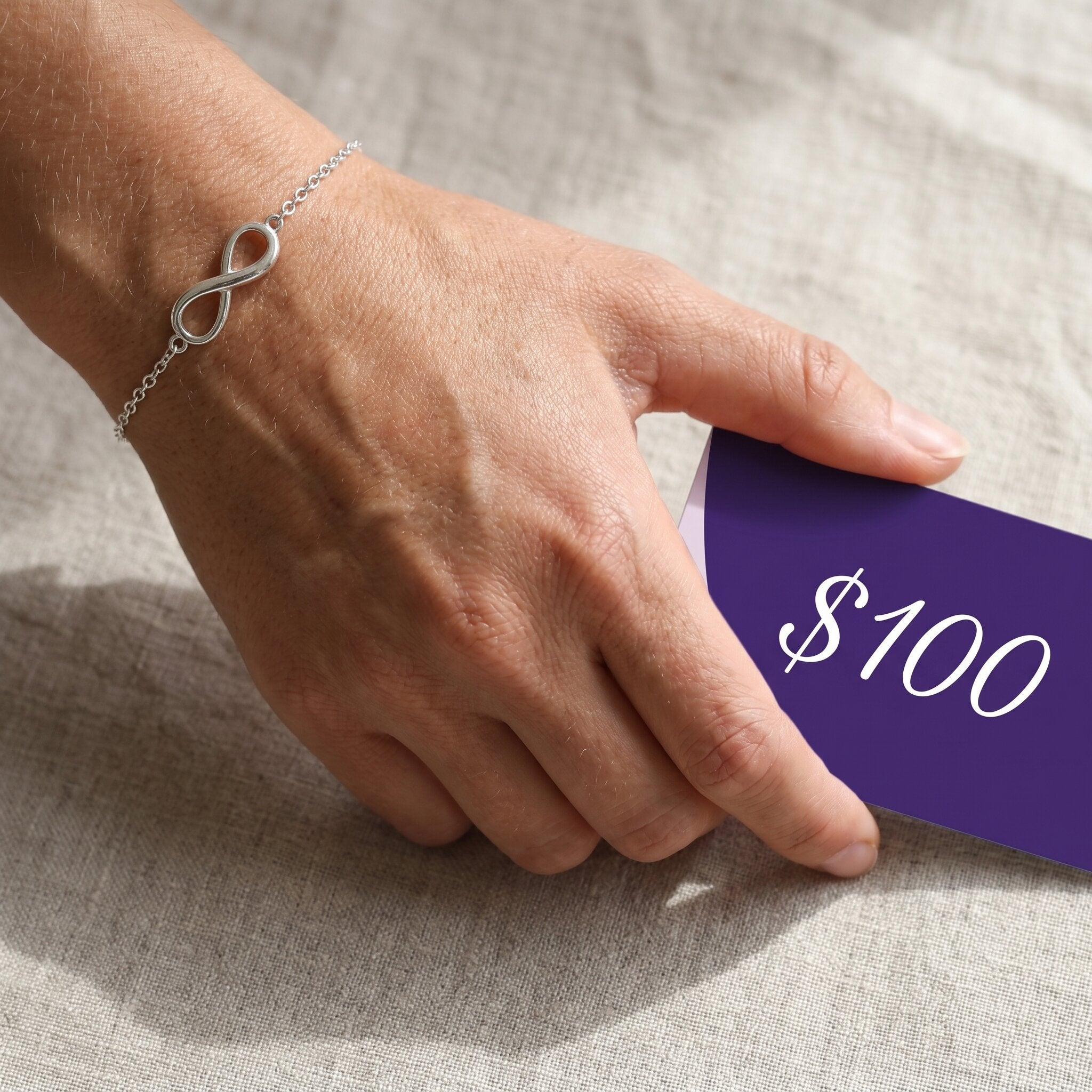 Gift card offer with free silver infinity bracelet, jewellery gift voucher and bonus bracelet promotion