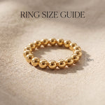 Golden link ring size guide showing band width and chain link design proportions