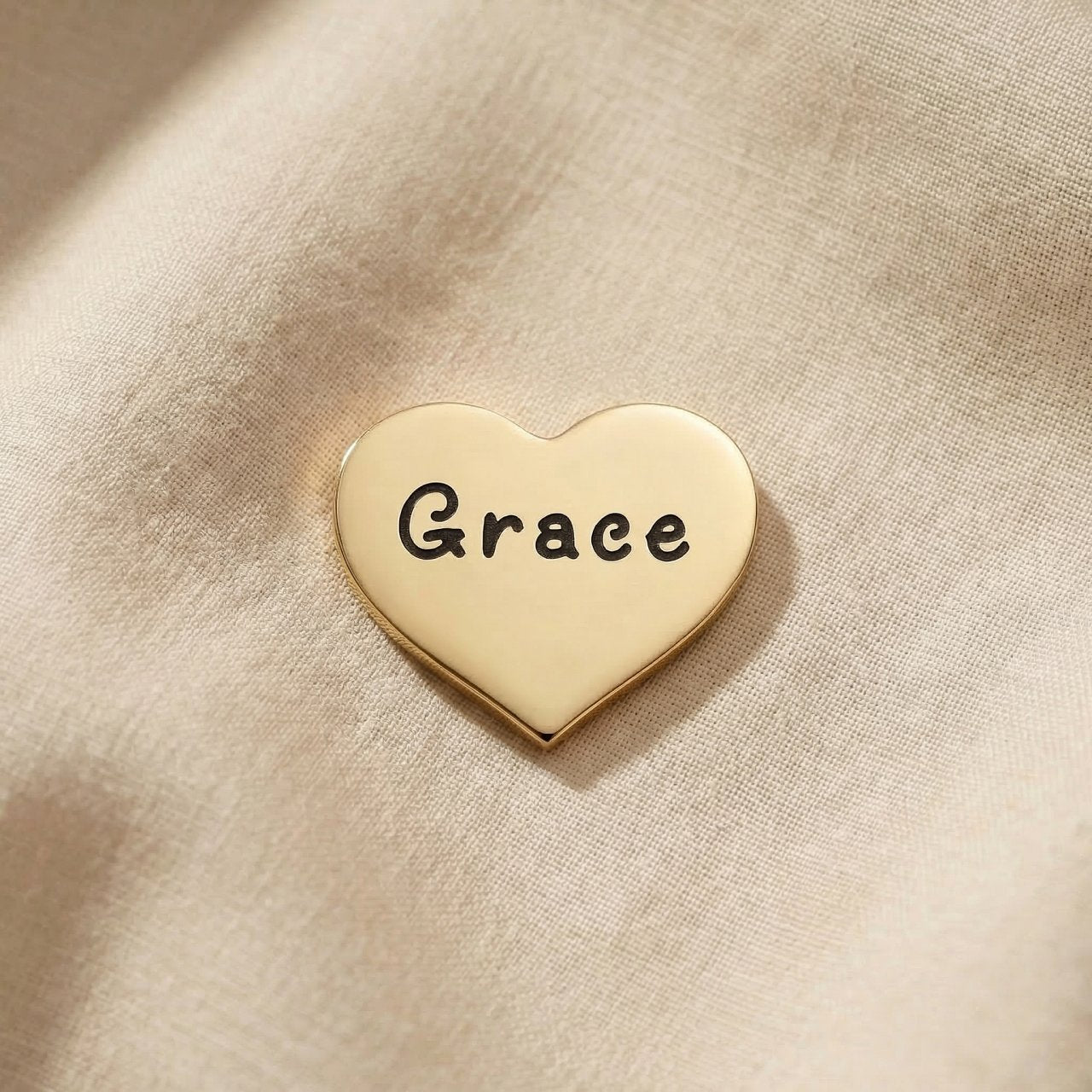 Personalized gold heart charm for Dream Locket bracelet with engraved name and sentimental love keepsake design