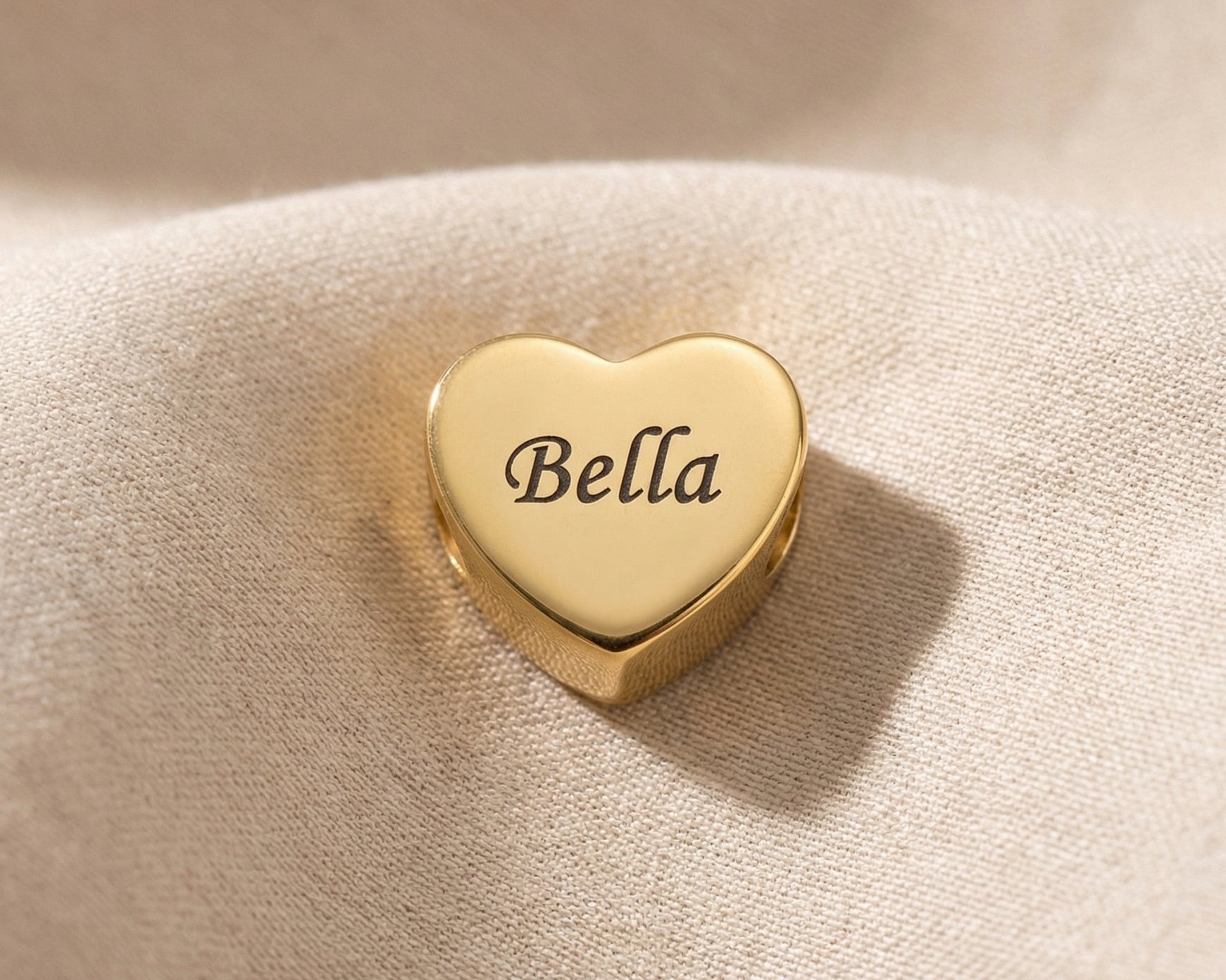 Personalized gold heart charm for Moments Bracelet with custom engraved name in elegant script style