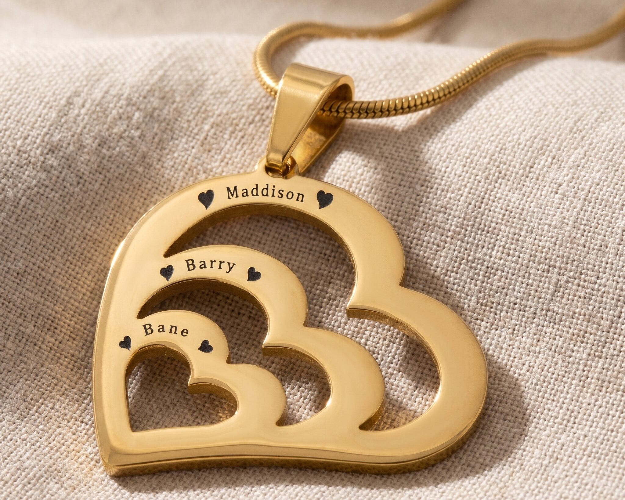 Heart of love necklace in gold with three heart pendant design, meaningful love keepsake jewellery gift