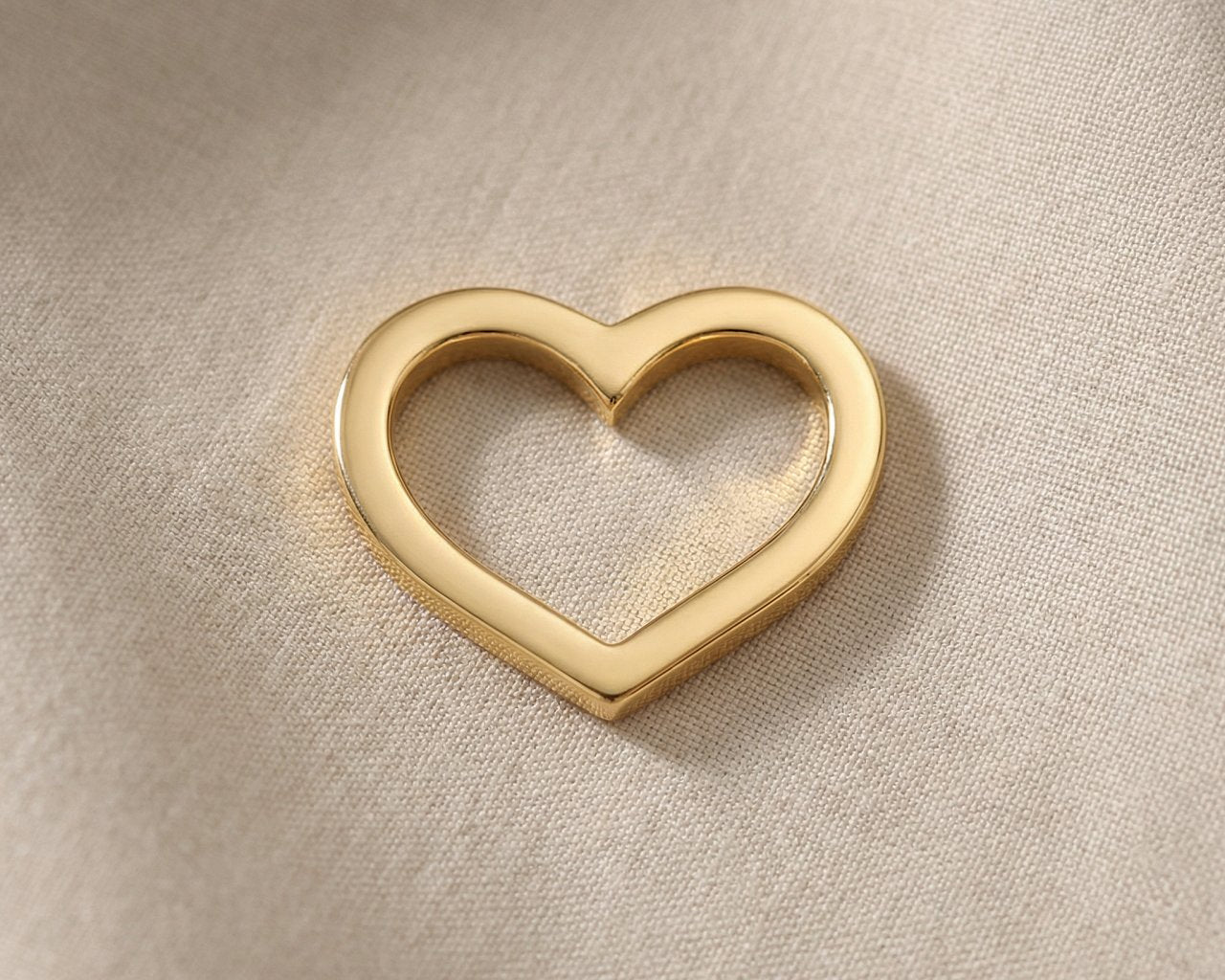Gold heart outline charm for Dream Locket bracelet symbolizing love, connection, and timeless sentimental memories