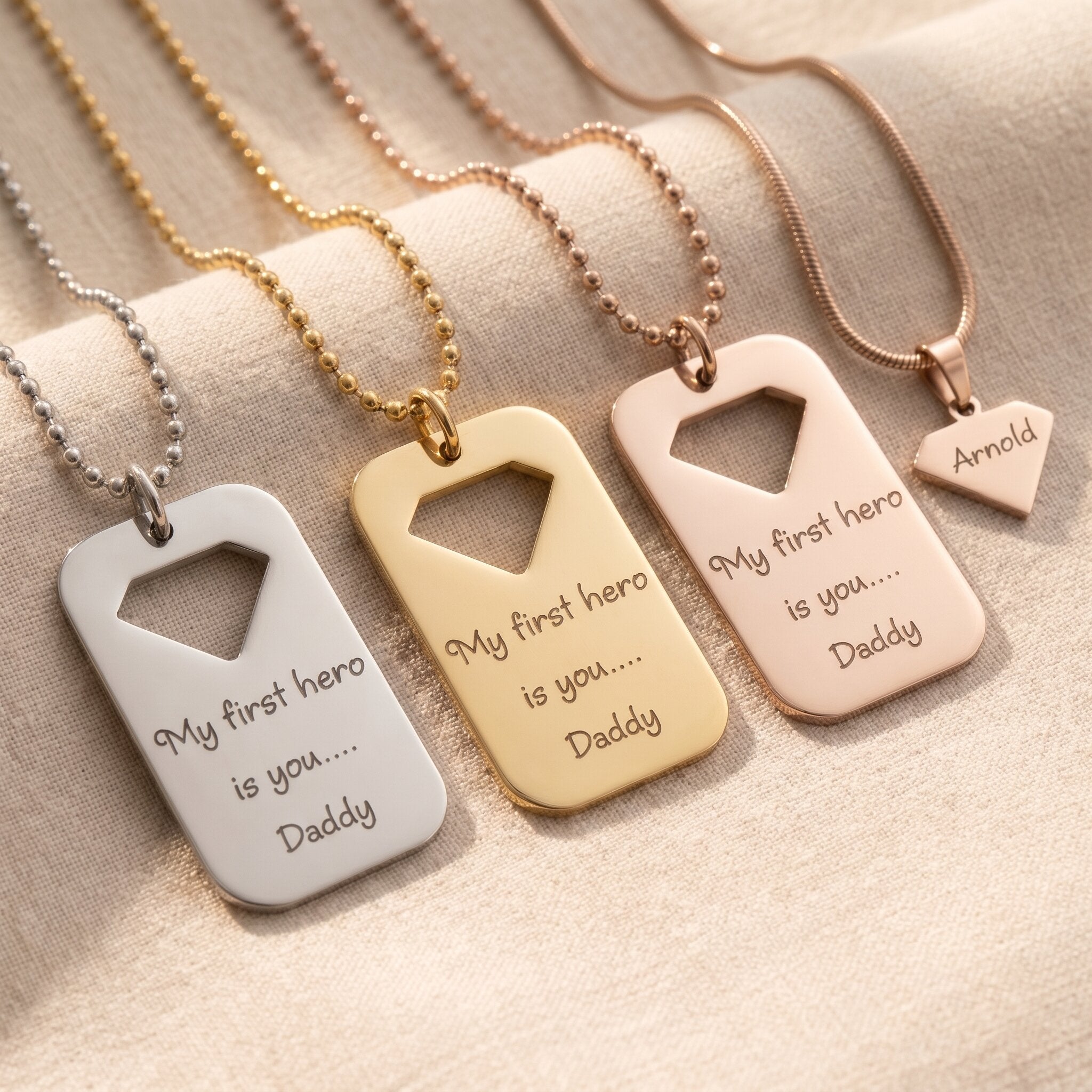 Personalised dog tag necklace tone comparison showing gold, silver and rose gold engraved finishes