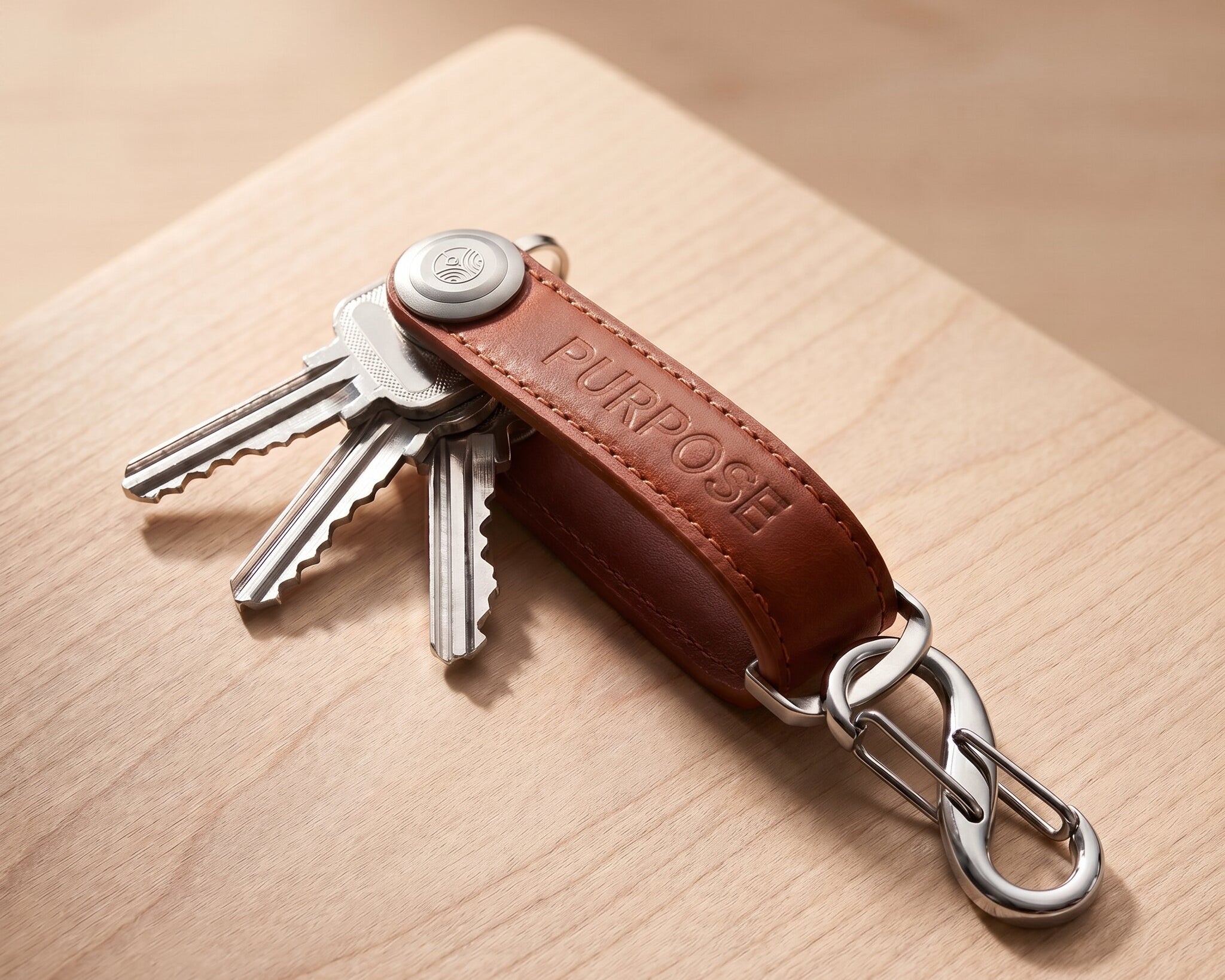 Leather key organizer in brown with compact key holder design, practical everyday carry accessory