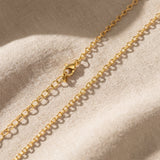 Link chain necklace in gold with polished chain link design, elegant jewellery for layering and everyday wear