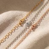 Link chain necklace tone comparison showing gold, silver and rose gold minimalist chain jewellery finishes