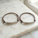 Belle Fever matching bar cord bracelet set with engraved bars, adjustable personalised couple bracelets made for shared memories.